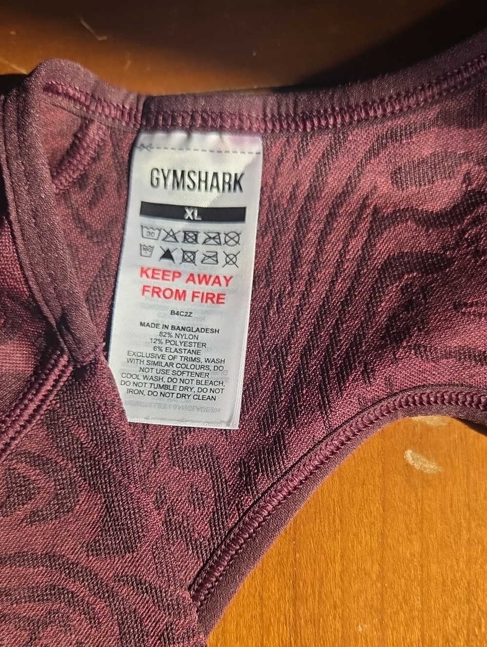 Gymshark Animal Print Maroon Twist Front Long Sleeve Crop Top - Picture 2 of 3